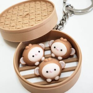 monkey bun fidget ( dim sum ) keychain