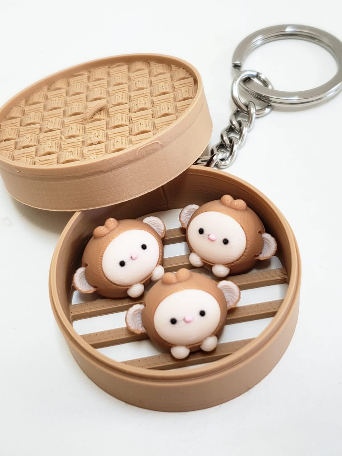 monkey bun fidget ( dim sum ) keychain monkey bun fidget ( dim sum ) keychain